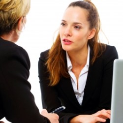 women in meeting listening