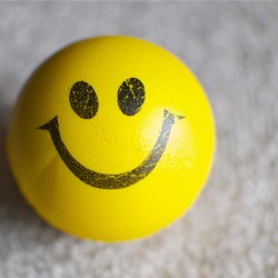 Yellow ball with happy face