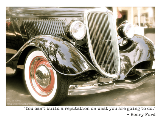 Black classic Ford roadster with quote from Henry Ford