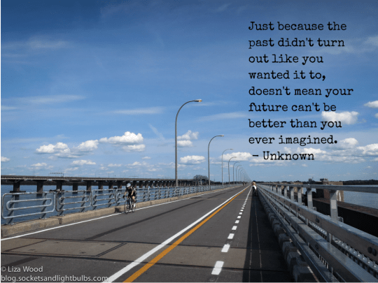 Cyclists on a long straight road