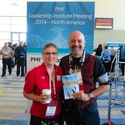 Joseph Flahiff holding book at PMI LIM
